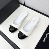 BOW MULE IN WHITE FUR AND BLACK CALFSKIN